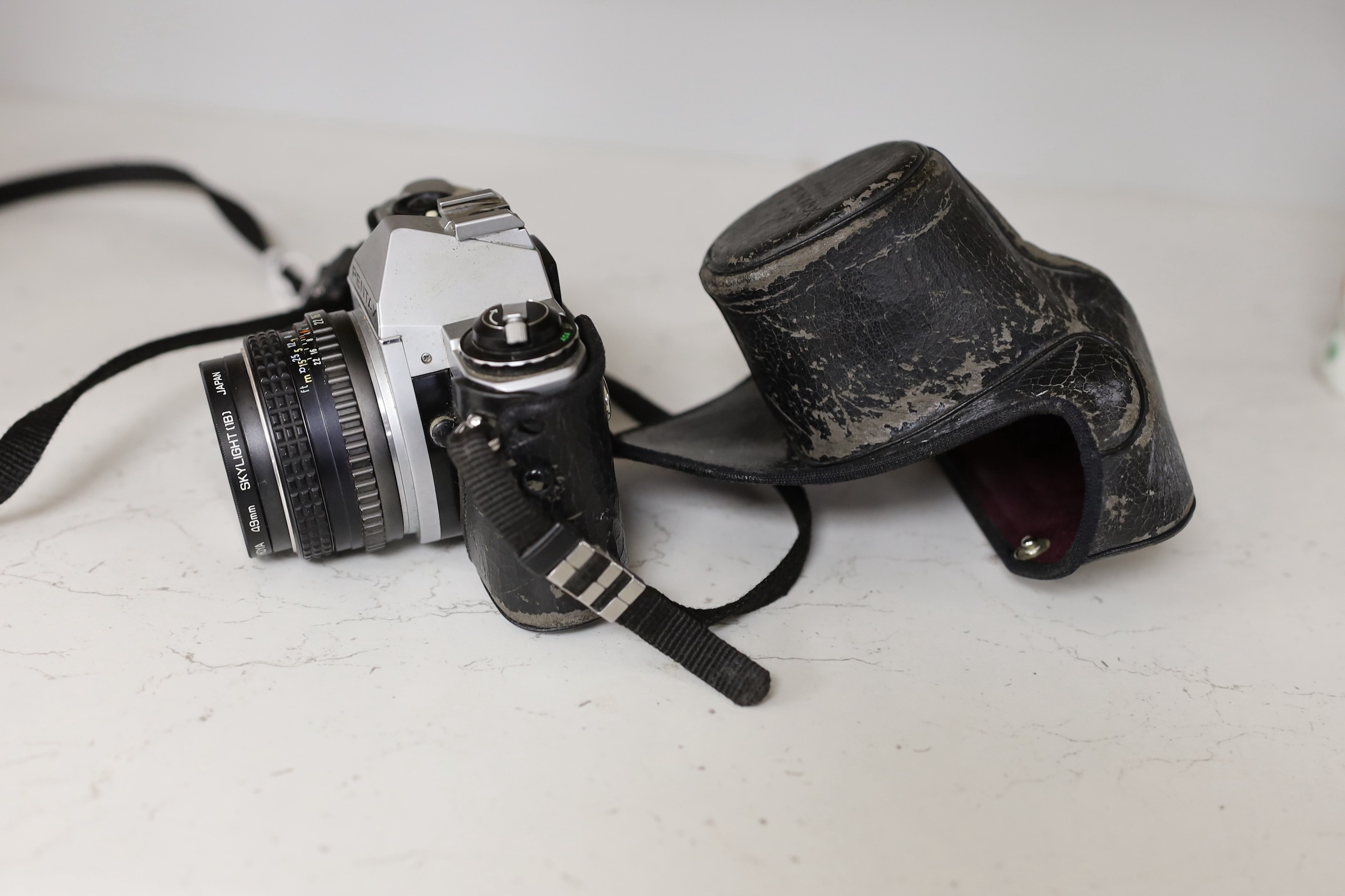 A Pentax ME Super SLR camera